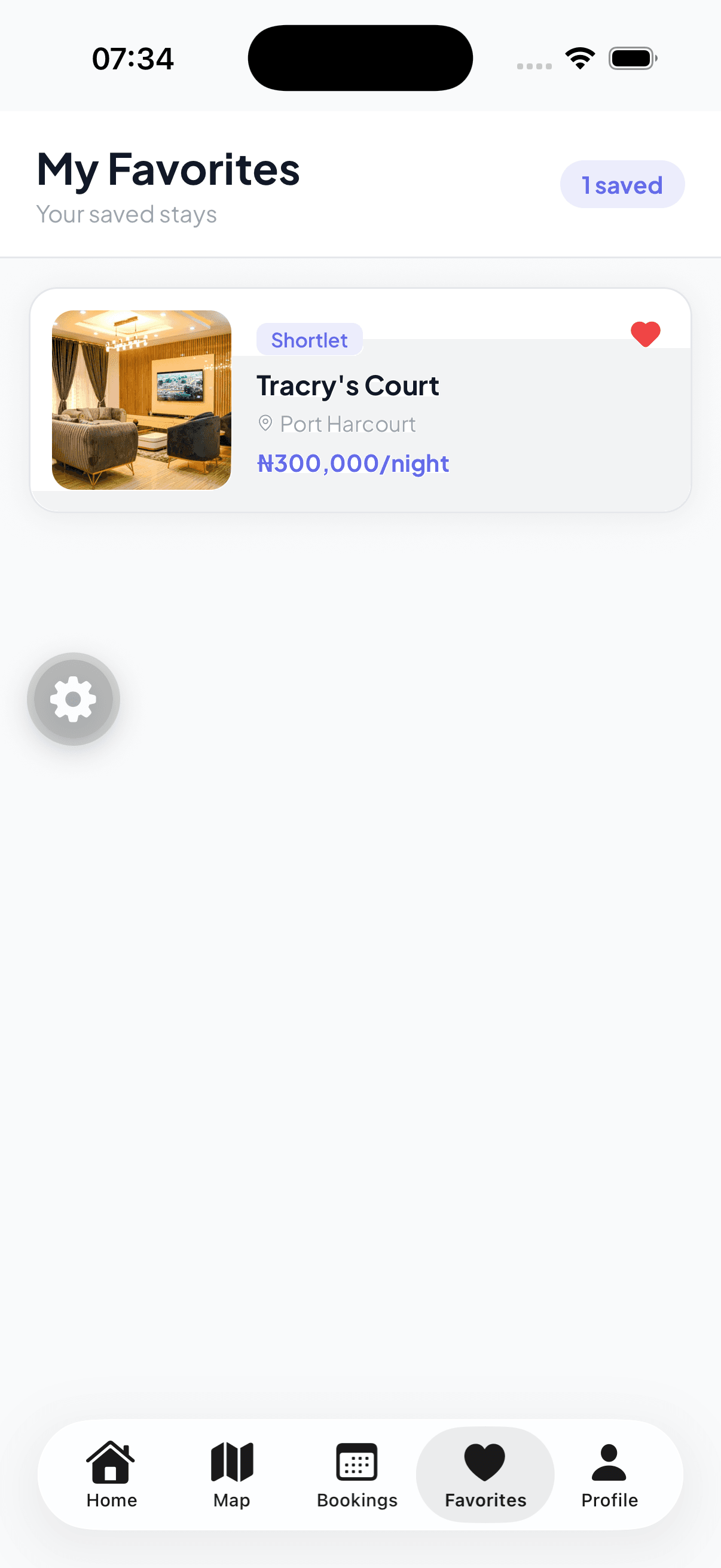 Roomly app favourites screen listing a saved shortlet with its location and nightly price